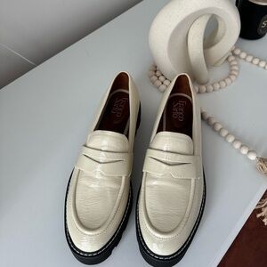 Cream and black loafer platform shoes